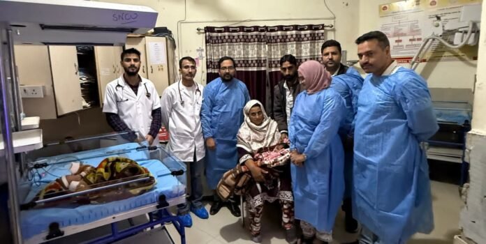 GMC Doda NICU staff caring for a newborn baby